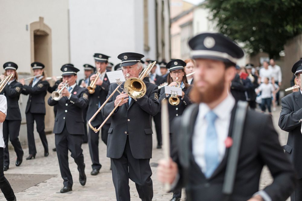 Musicians playing music while walking at the Echternach Spring Procession