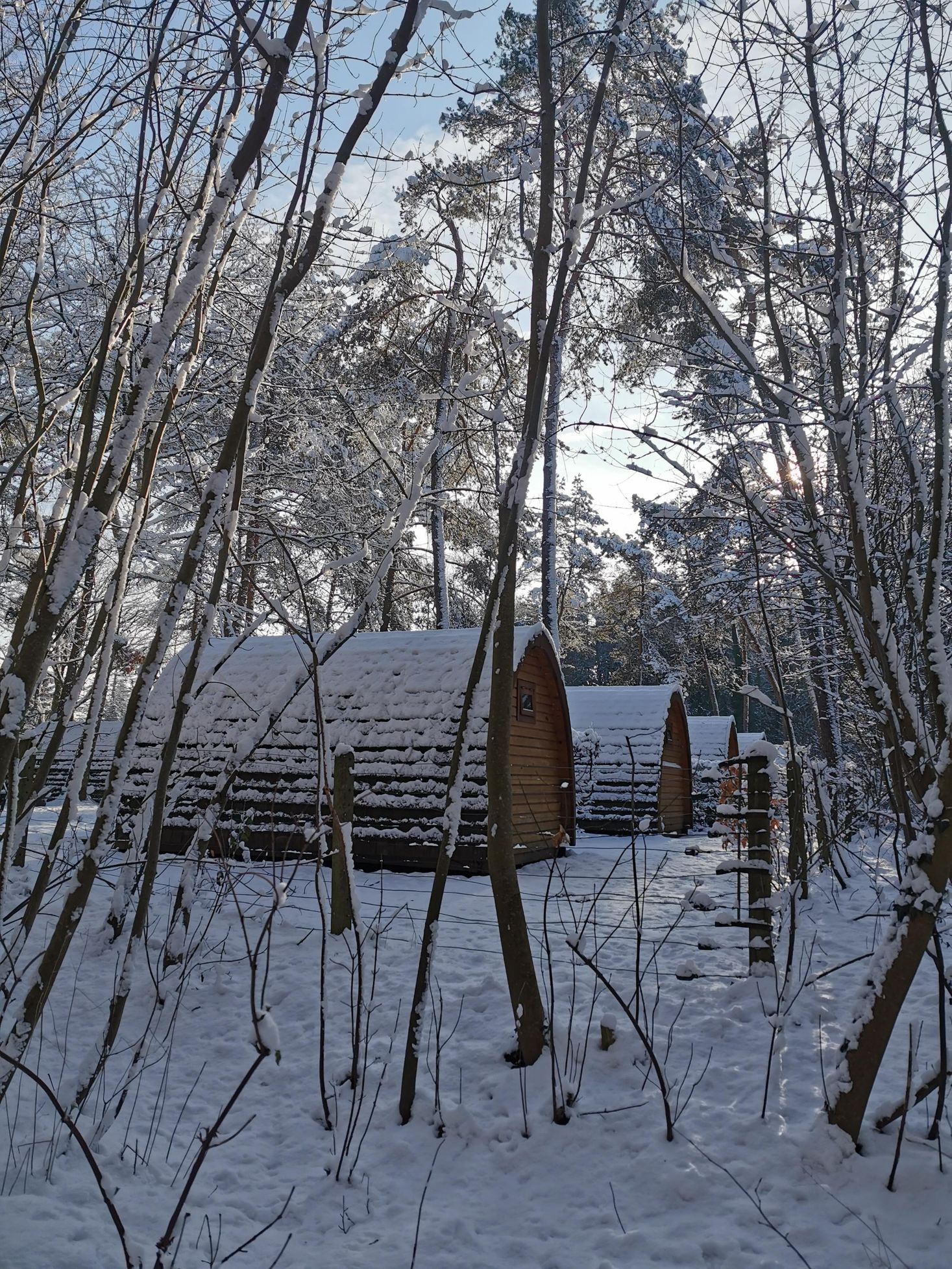 Camping pods in winter at Camping Martbusch in Berdorf